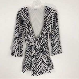 Vagabond Ruffle Hem Wrap Romper Bell Sleeve